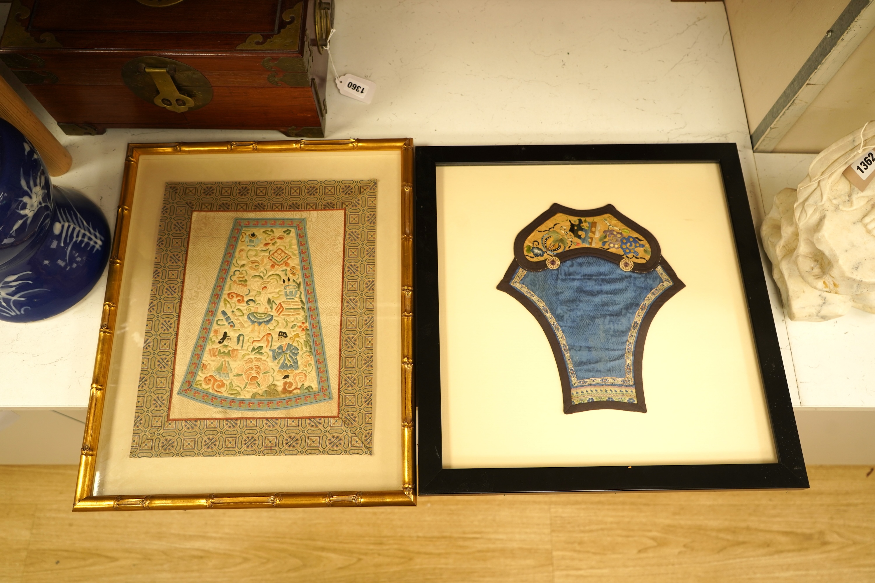 Two Chinese silk panels with polychrome embroidery, one housed in a faux bamboo frame, largest 47cm high